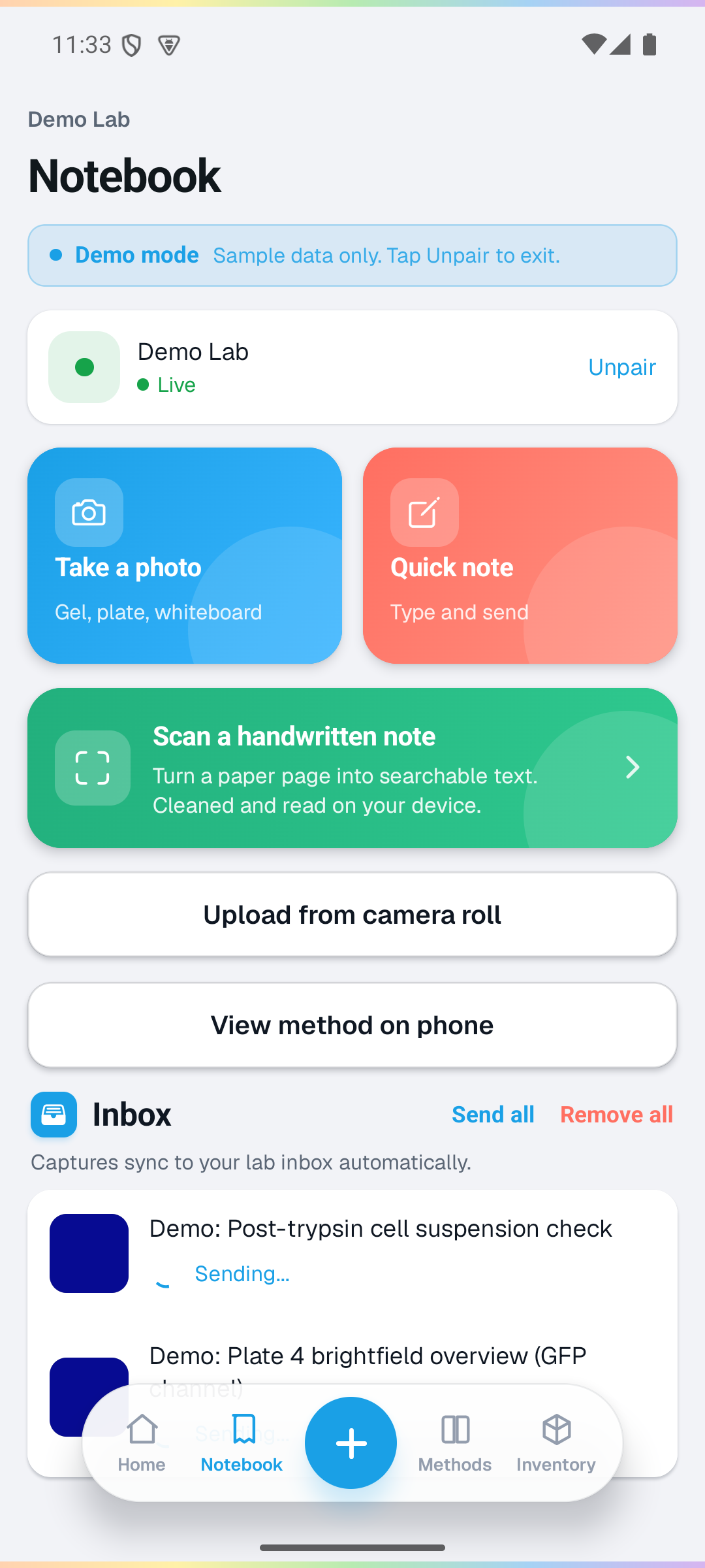 The Companion Notebook tab on a phone, showing the Take a photo and Quick note action cards at the top, the Scan a handwritten note card, and the Upload from camera roll button below.
